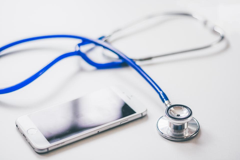 Stethoscope resting on a clean clinical surface
